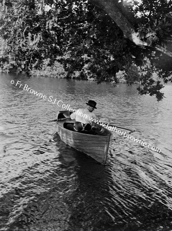 MAN IN BOAT